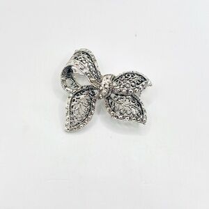 Elegant Silver Bow Brooch